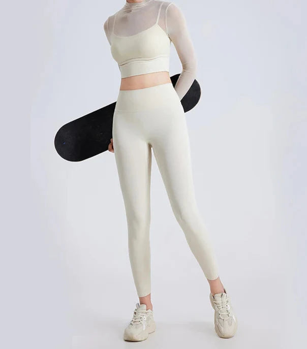 Conjunto Deportivo con Top de Manga Larga en Tul y Calza Ref: 1040
